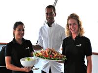 Chef and stewardesses onboard Sealion
